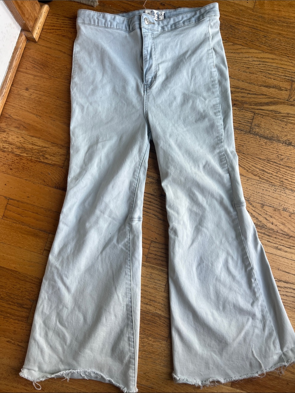 We The Free Light light blue Flared Jeans with Raw Hem